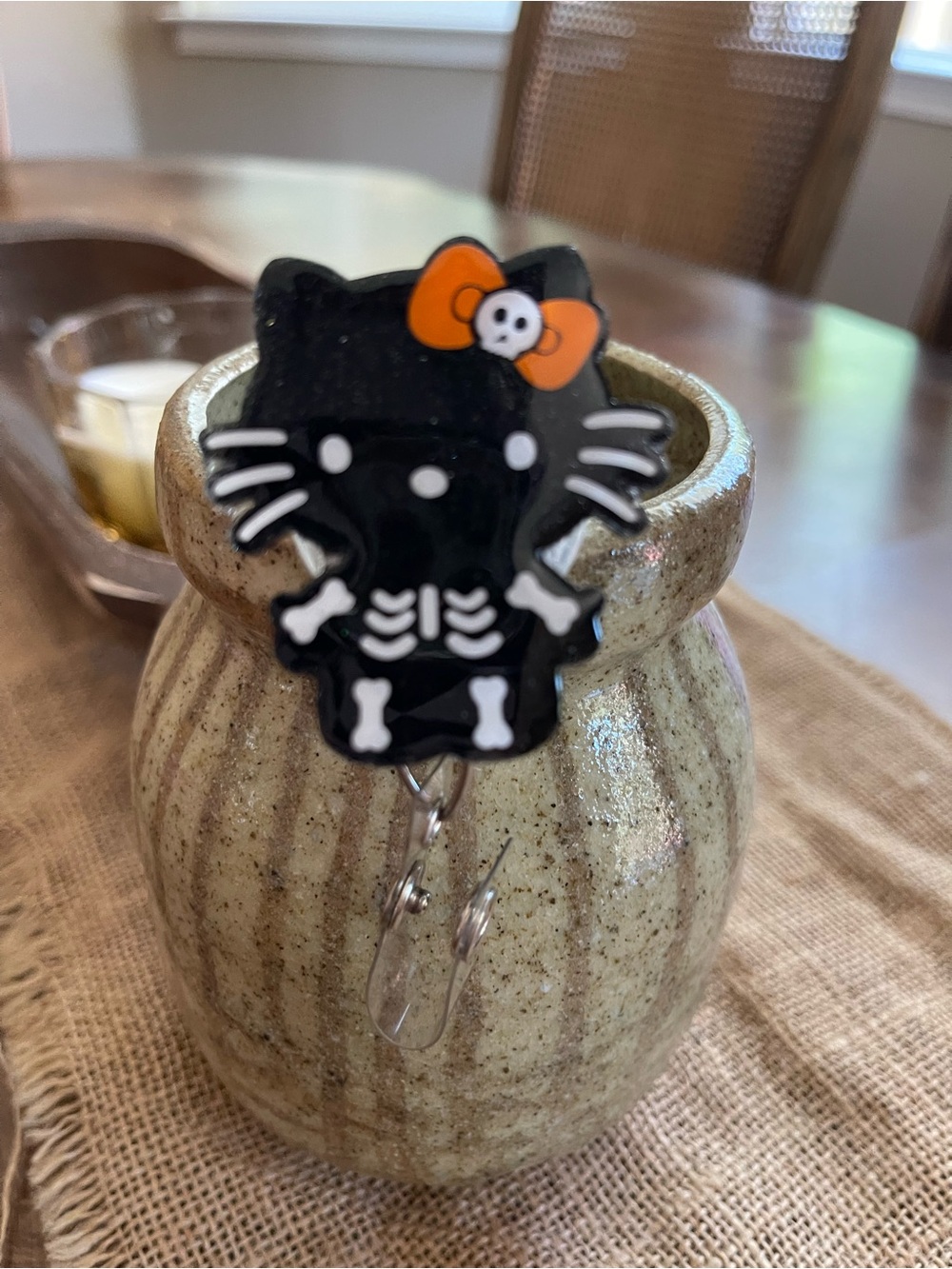 Black Hello Kitty Halloween Skeleton Badge Reel with Orange Bow